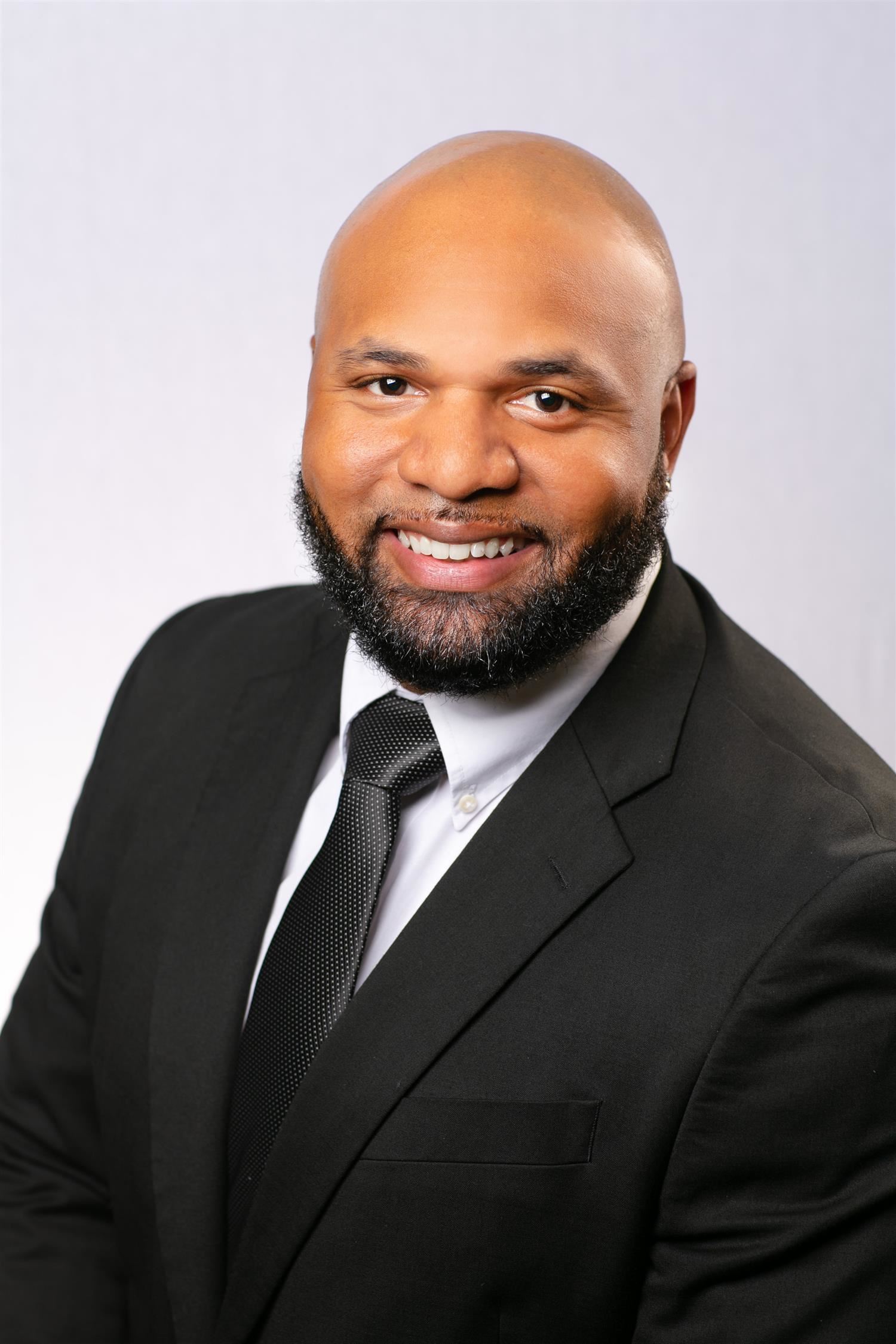 De'Vion Moore, Chief Academic Officer