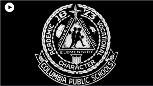 Image of the original CPS crest from 1873 with a small play button in the upper right.