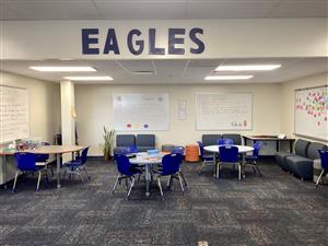 Makerspace full of tables, chairs, and whiteboards